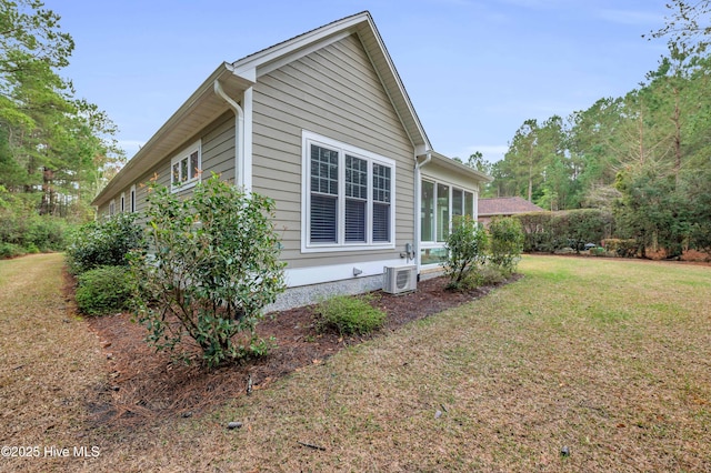 1115 Eldora Ct, Leland, NC 28451 - view of side of property with a lawn and ac unit