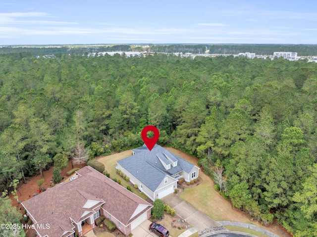 1115 Eldora Ct, Leland, NC 28451 - aerial view of property and surrounding area with a forest