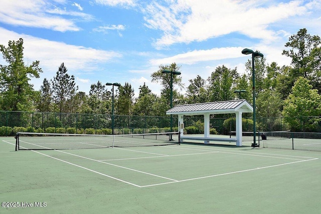 1115 Eldora Ct, Leland, NC 28451 - view of tennis court featuring community basketball court and view of scattered trees
