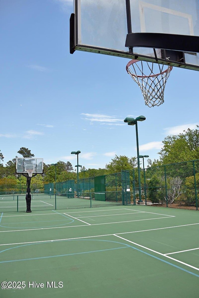 1115 Eldora Ct, Leland, NC 28451 - view of sport court featuring a tennis court and community basketball court
