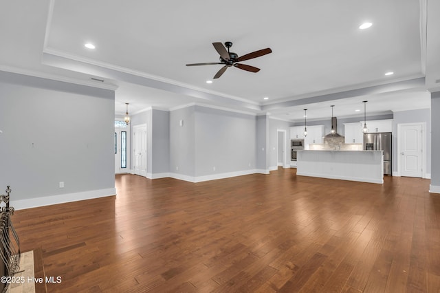 1115 Eldora Ct, Leland, NC 28451 - unfurnished living room with ceiling fan, dark wood-style flooring, baseboards, recessed lighting, and ornamental molding