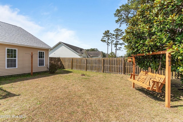 view of yard featuring a fenced backyard