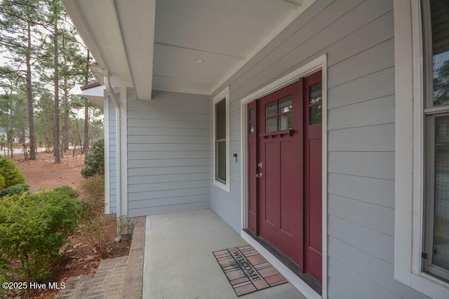 entrance to property with covered porch