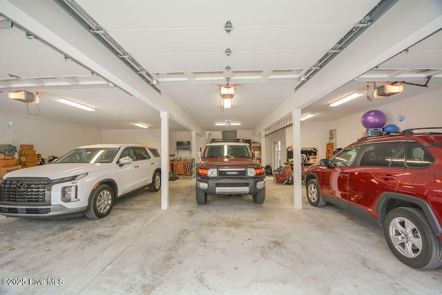 garage featuring a garage door opener