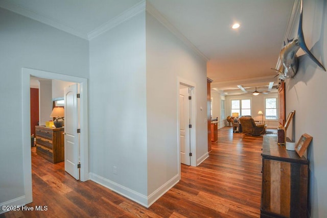 hall with recessed lighting, wood finished floors, baseboards, and ornamental molding