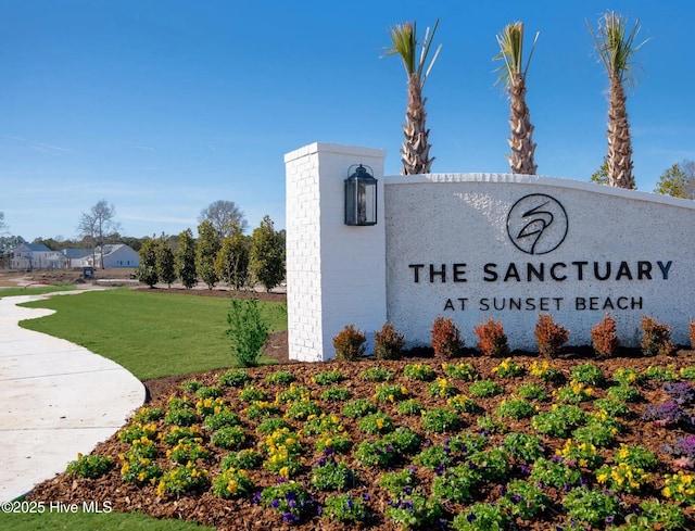 1514 Manta Ray Way, Sunset Beach, NC 28468 - community / neighborhood sign featuring a lawn