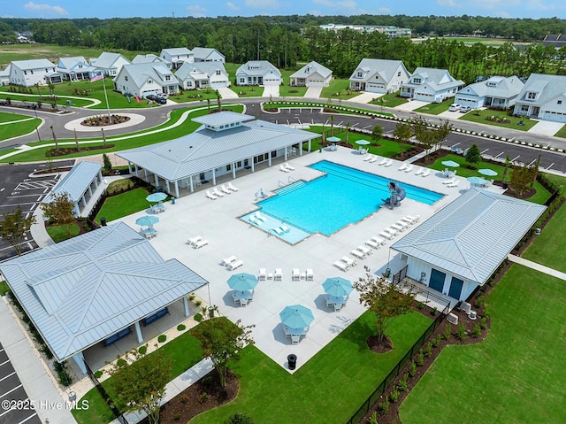 1514 Manta Ray Way, Sunset Beach, NC 28468 - aerial perspective of suburban area with a pool