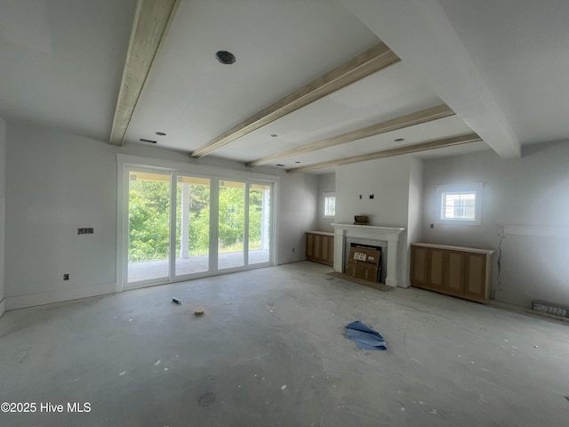 1514 Manta Ray Way, Sunset Beach, NC 28468 - unfurnished living room with beam ceiling, a fireplace, and baseboards