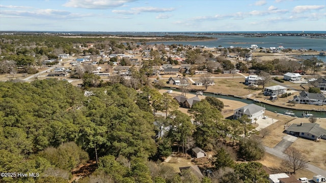 bird's eye view with a water view and a residential view