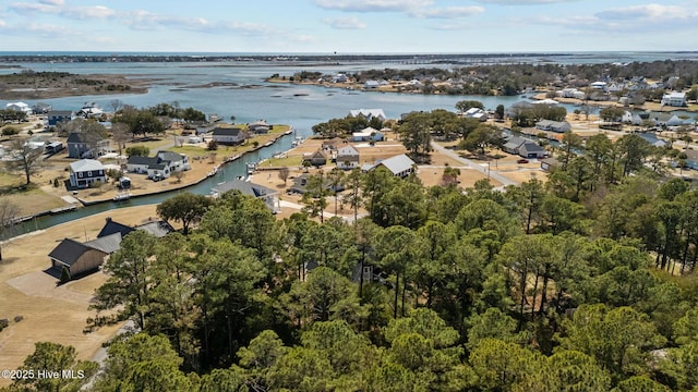 aerial view featuring a water view and a residential view