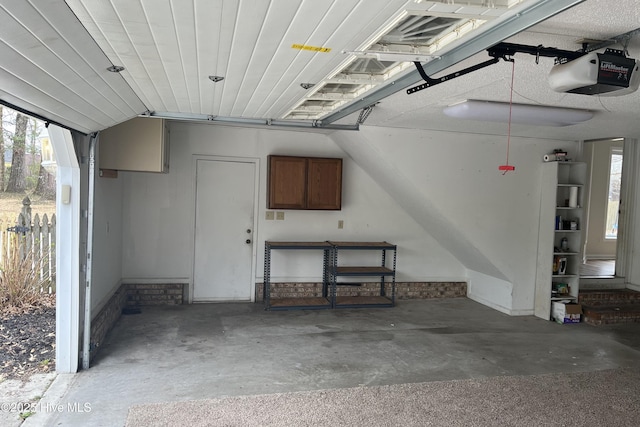 garage featuring a garage door opener