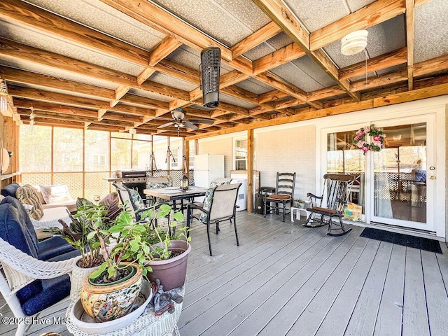 wooden deck with outdoor dining space