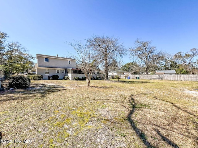 view of yard with fence