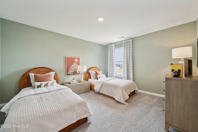 bedroom featuring carpet flooring, baseboards, and visible vents