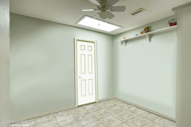 179 Sea Gull Ln, North Topsail Beach, NC 28460 - unfurnished room with ceiling fan and light tile patterned flooring