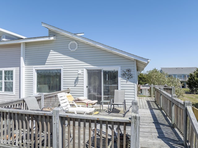 179 Sea Gull Ln, North Topsail Beach, NC 28460 - rear view of house with a deck