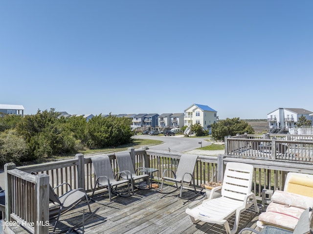 179 Sea Gull Ln, North Topsail Beach, NC 28460 - wooden deck featuring a residential view