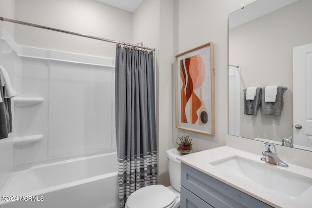 bathroom featuring shower / bath combination with curtain, toilet, and vanity