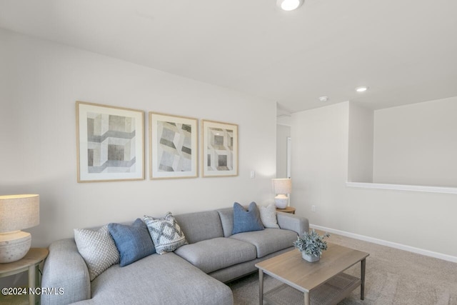 living area with carpet flooring, recessed lighting, and baseboards