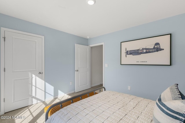 bedroom featuring baseboards