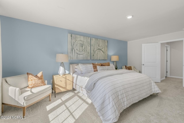 bedroom with carpet flooring and baseboards