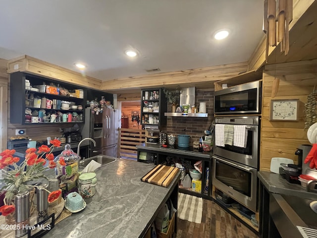 kitchen with visible vents, a sink, open shelves, recessed lighting, and appliances with stainless steel finishes