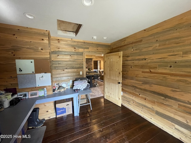 office with hardwood / wood-style floors, recessed lighting, and wood walls