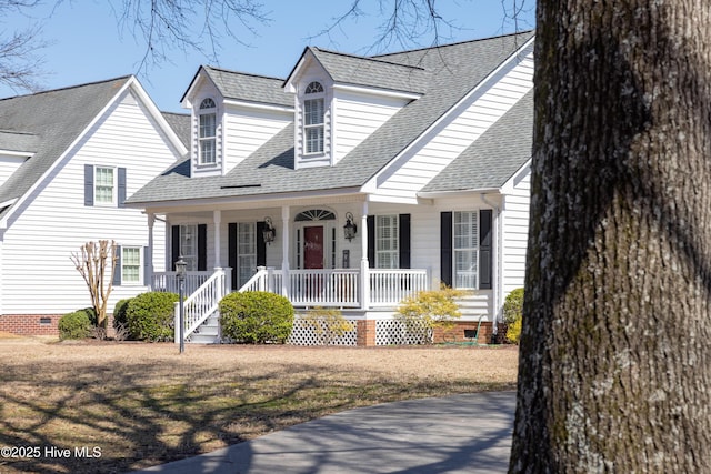 cape cod home featuring crawl space, a porch, and a shingled roof