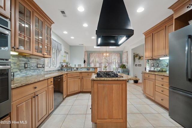 kitchen with light tile patterned flooring, freestanding refrigerator, extractor fan, black dishwasher, and a center island