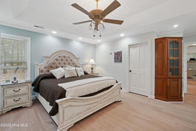 bedroom with recessed lighting, visible vents, baseboards, and light wood-style floors