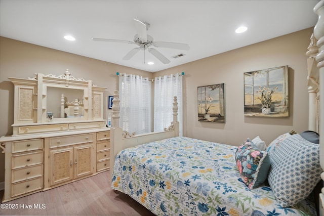 bedroom featuring a ceiling fan, recessed lighting, visible vents, and light wood finished floors