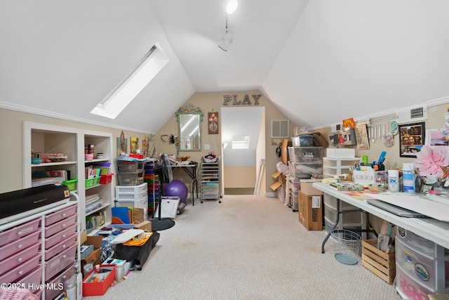 carpeted office space with lofted ceiling with skylight and visible vents