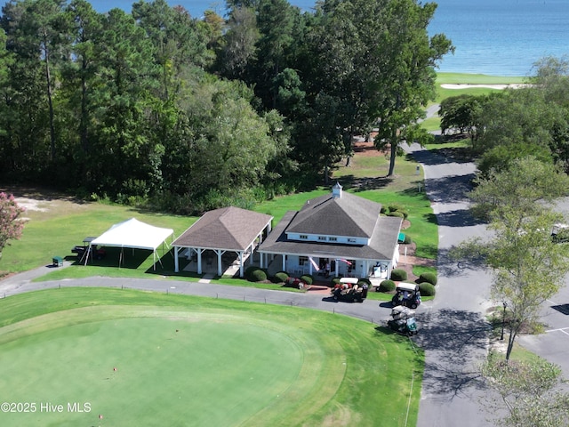 birds eye view of property featuring a water view and view of golf course