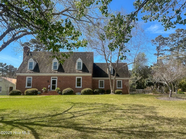 661 Main St, Swansboro, NC 28584 - cape cod house featuring brick siding and a chimney