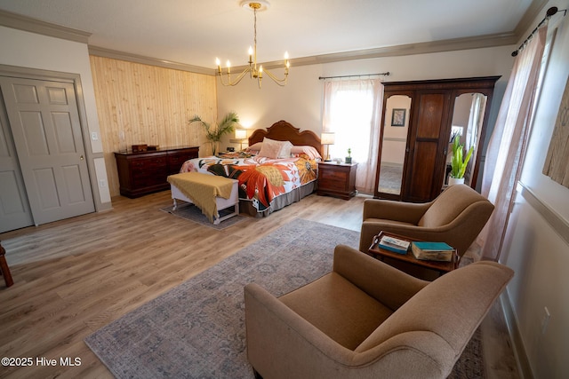 661 Main St, Swansboro, NC 28584 - bedroom featuring ornamental molding, a chandelier, multiple windows, wood finished floors, and wooden walls