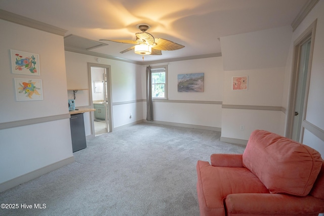 661 Main St, Swansboro, NC 28584 - living area featuring light carpet, crown molding, baseboards, and a ceiling fan