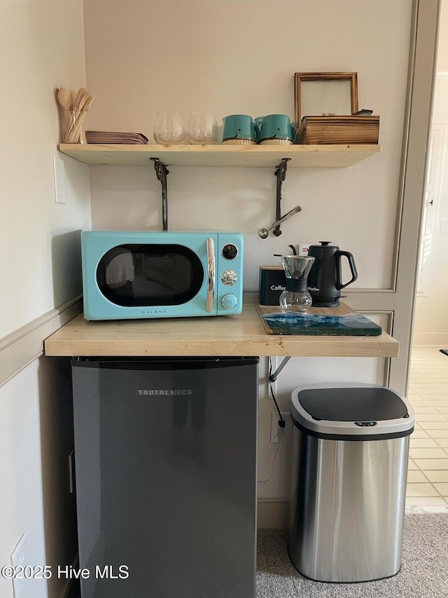 661 Main St, Swansboro, NC 28584 - laundry room with tile patterned floors