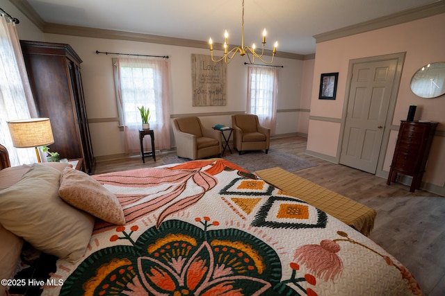 bedroom with crown molding, multiple windows, wood finished floors, and a notable chandelier