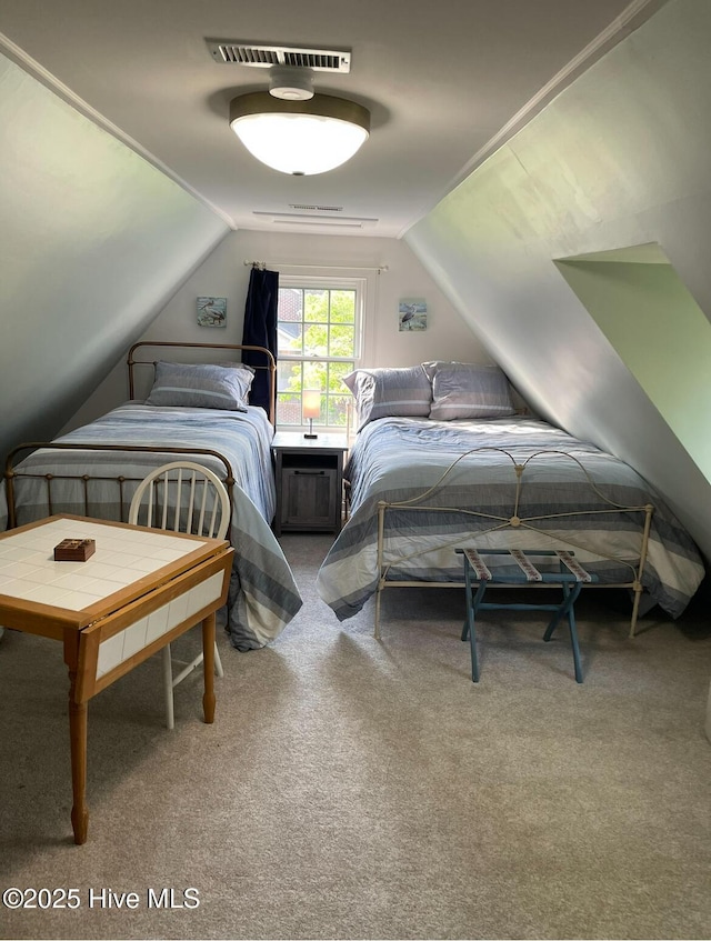 661 Main St, Swansboro, NC 28584 - carpeted bedroom featuring lofted ceiling