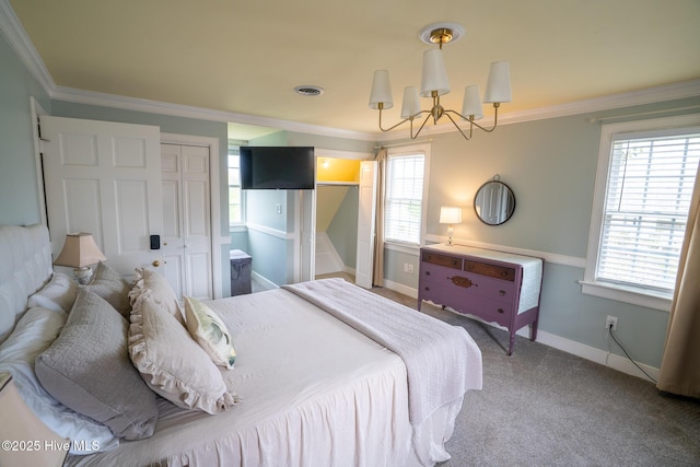 carpeted bedroom featuring an inviting chandelier, baseboards, ornamental molding, and visible vents