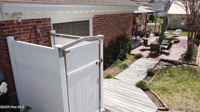 661 Main St, Swansboro, NC 28584 - exterior view of brick siding and roof with shingles