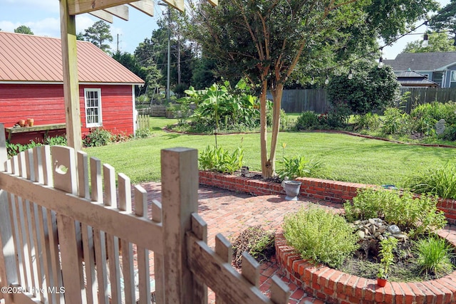 661 Main St, Swansboro, NC 28584 - view of yard featuring a patio area