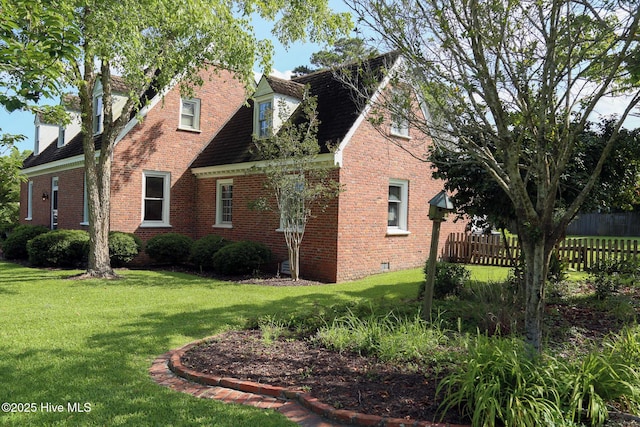 661 Main St, Swansboro, NC 28584 - view of side of home with brick siding and crawl space