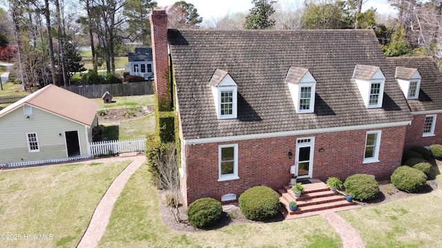 661 Main St, Swansboro, NC 28584 - cape cod house with brick siding and a chimney