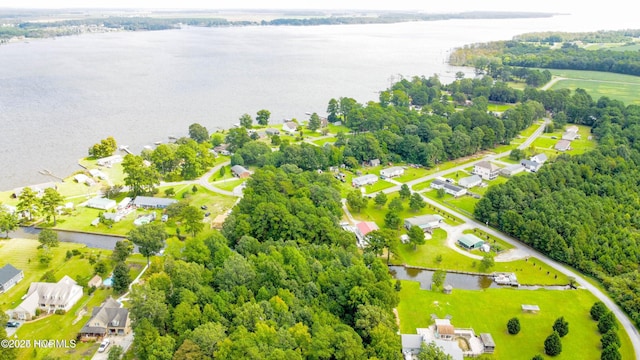 drone / aerial view with a residential view and a water view