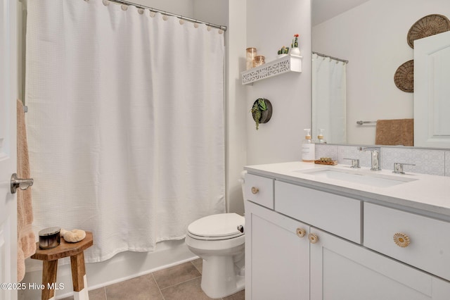 bathroom with vanity, shower / bath combination with curtain, tile patterned floors, toilet, and backsplash