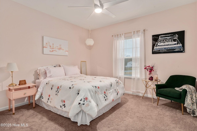 bedroom with carpet flooring, a ceiling fan, and baseboards