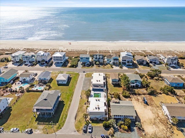 298 Ocean Blvd W # 103, Holden Beach, NC 28462 - birds eye view of property featuring a view of the beach, a residential view, and a water view