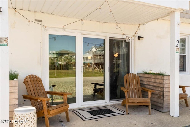 298 Ocean Blvd W # 103, Holden Beach, NC 28462 - entrance to property featuring stucco siding