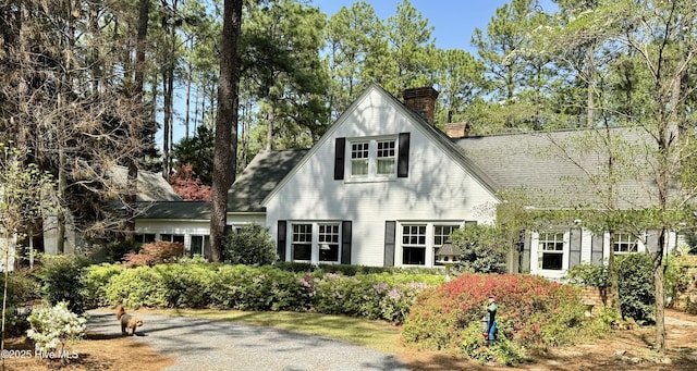 1335 Midland Rd, Southern Pines, NC 28387 - rear view of house featuring a chimney and roof with shingles